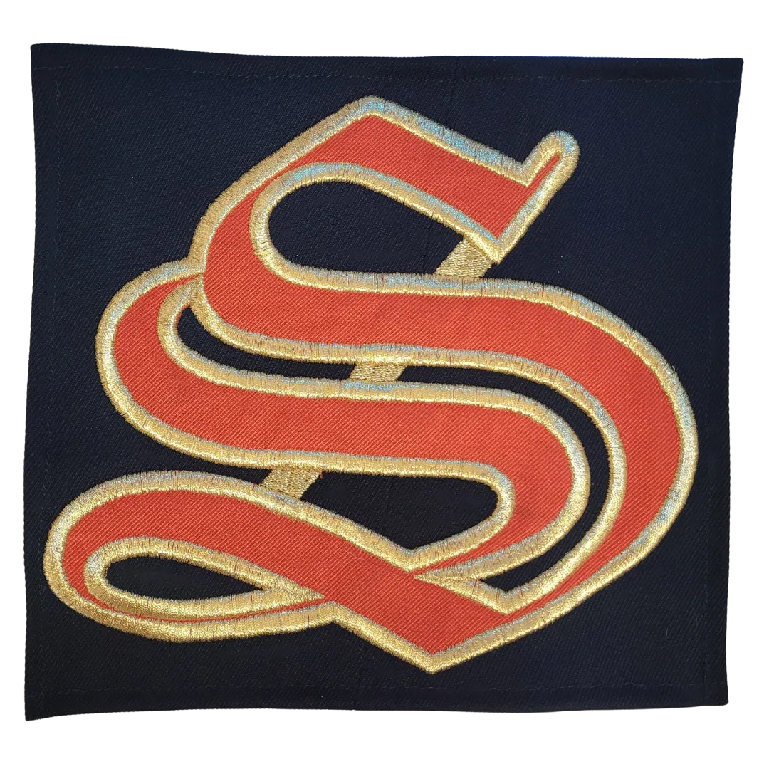 Logo from old uniform. Patch says "SPRAGUE".